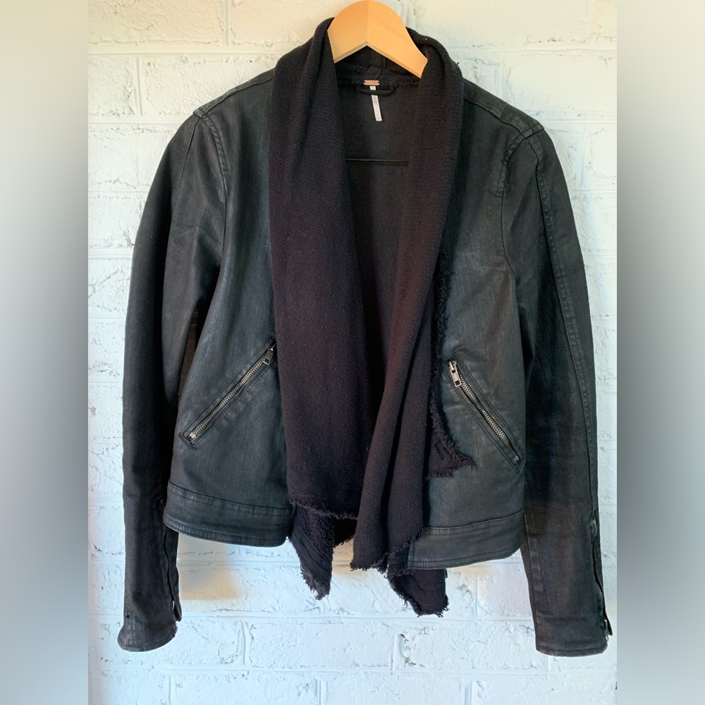 Free People waxed denim and knit jacket. Zipper details shown.
